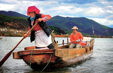 Mosuo Family on a boat